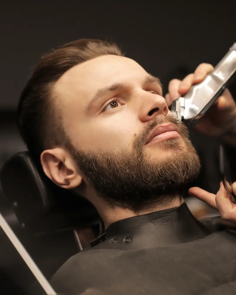 Master barber detailing a beard trim in Sioux Falls SD